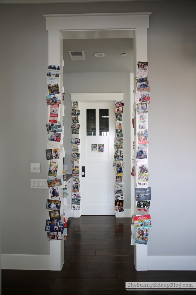 christmas-cards-displayed-on-door-molding