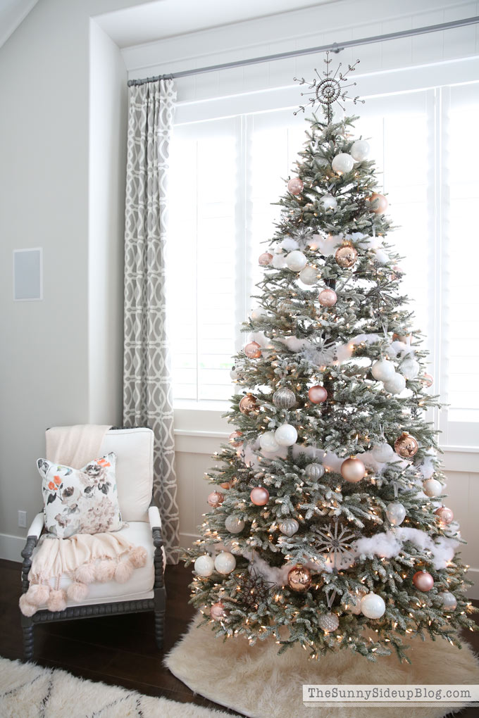 Artificial frosted pink, silver and white Christmas tree