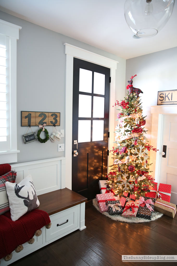 mudroom with built in cabinets and dutch door decked for Christmas! 